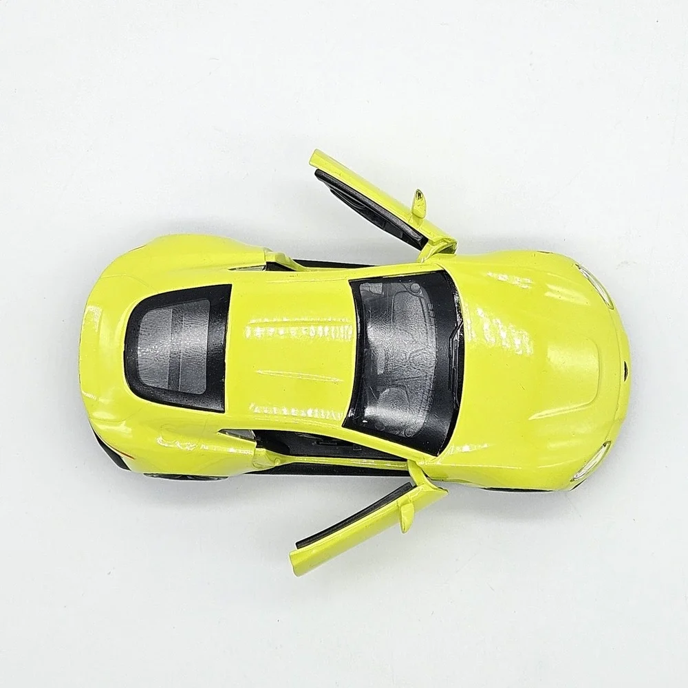 RMZ City Aston Martin Vantage Yellow Diecast Model Car 5 inch Pullback